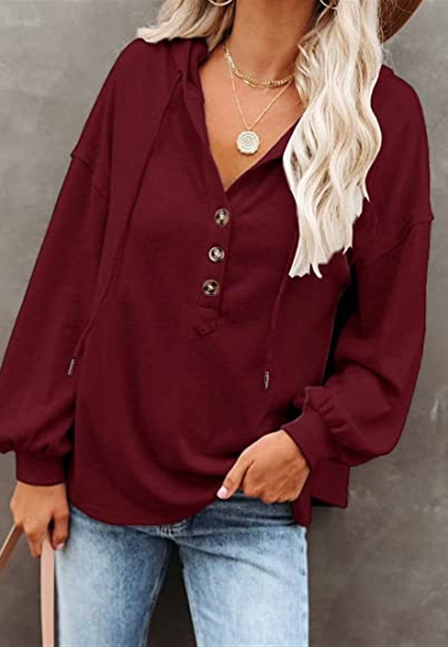 Sudadera con capucha y detalle de botones