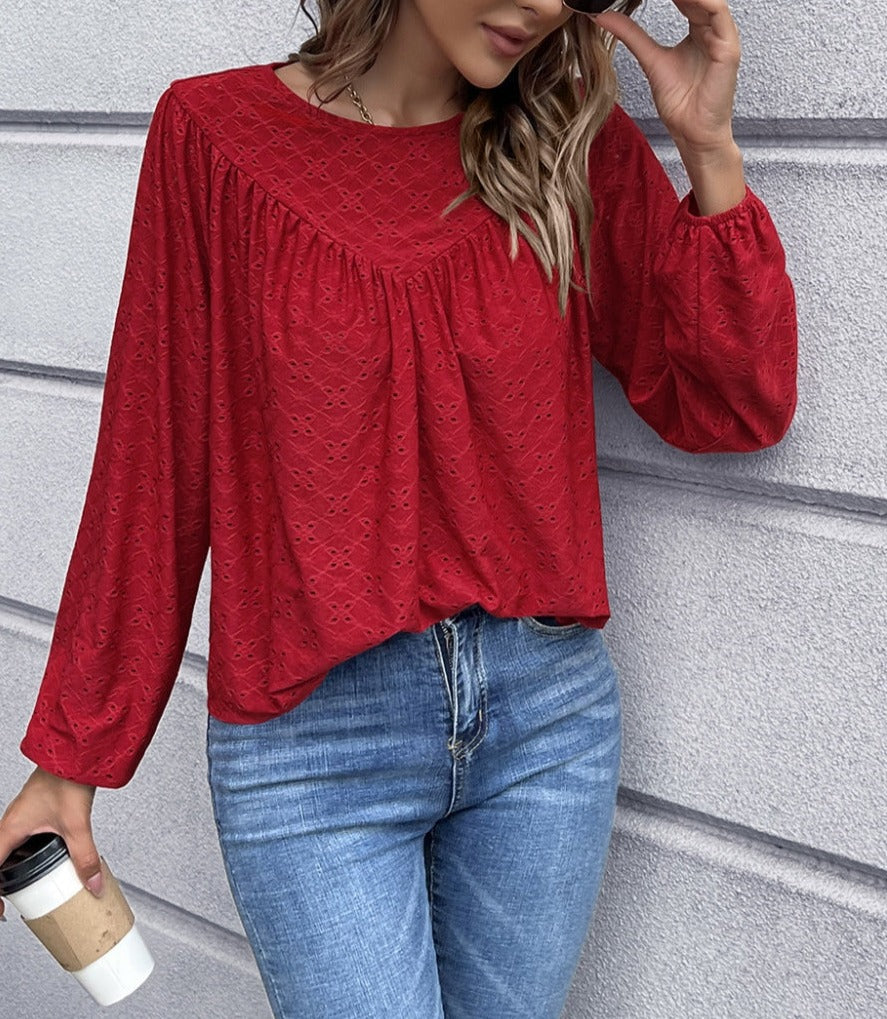 Blusa con detalle de triángulos y ojales