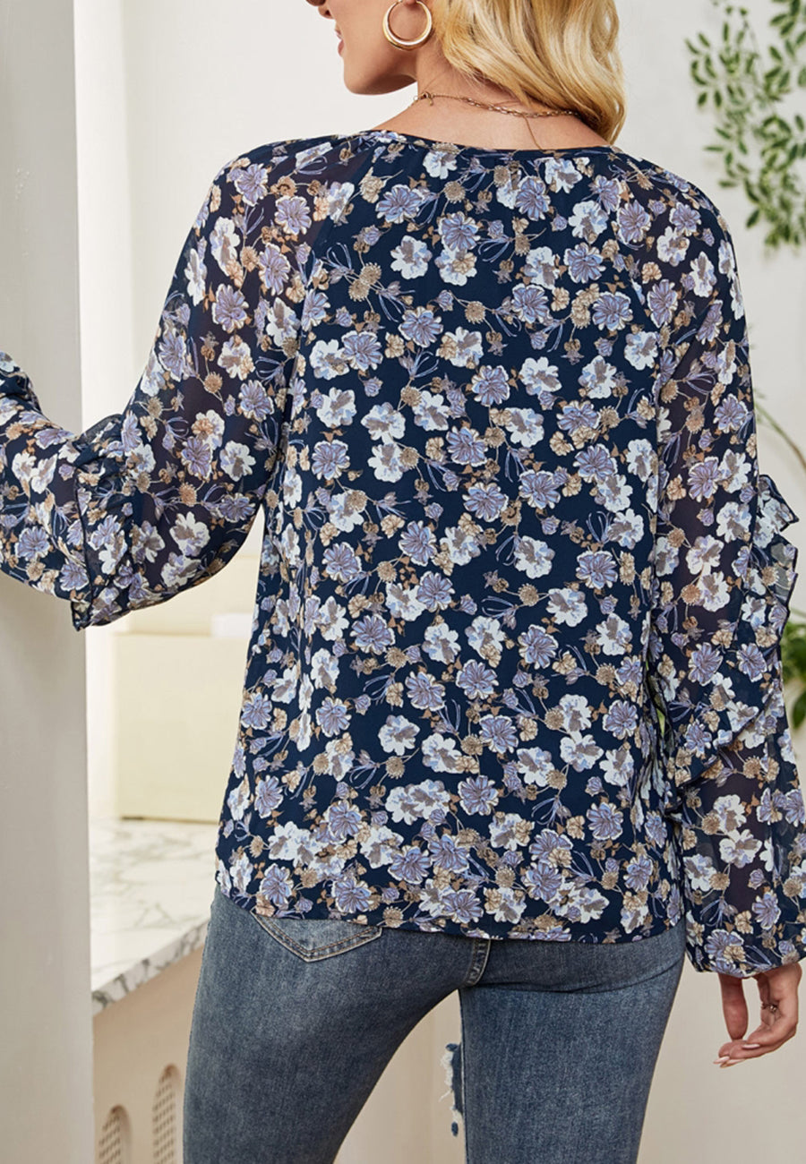 Blusa con volantes y estampado floral