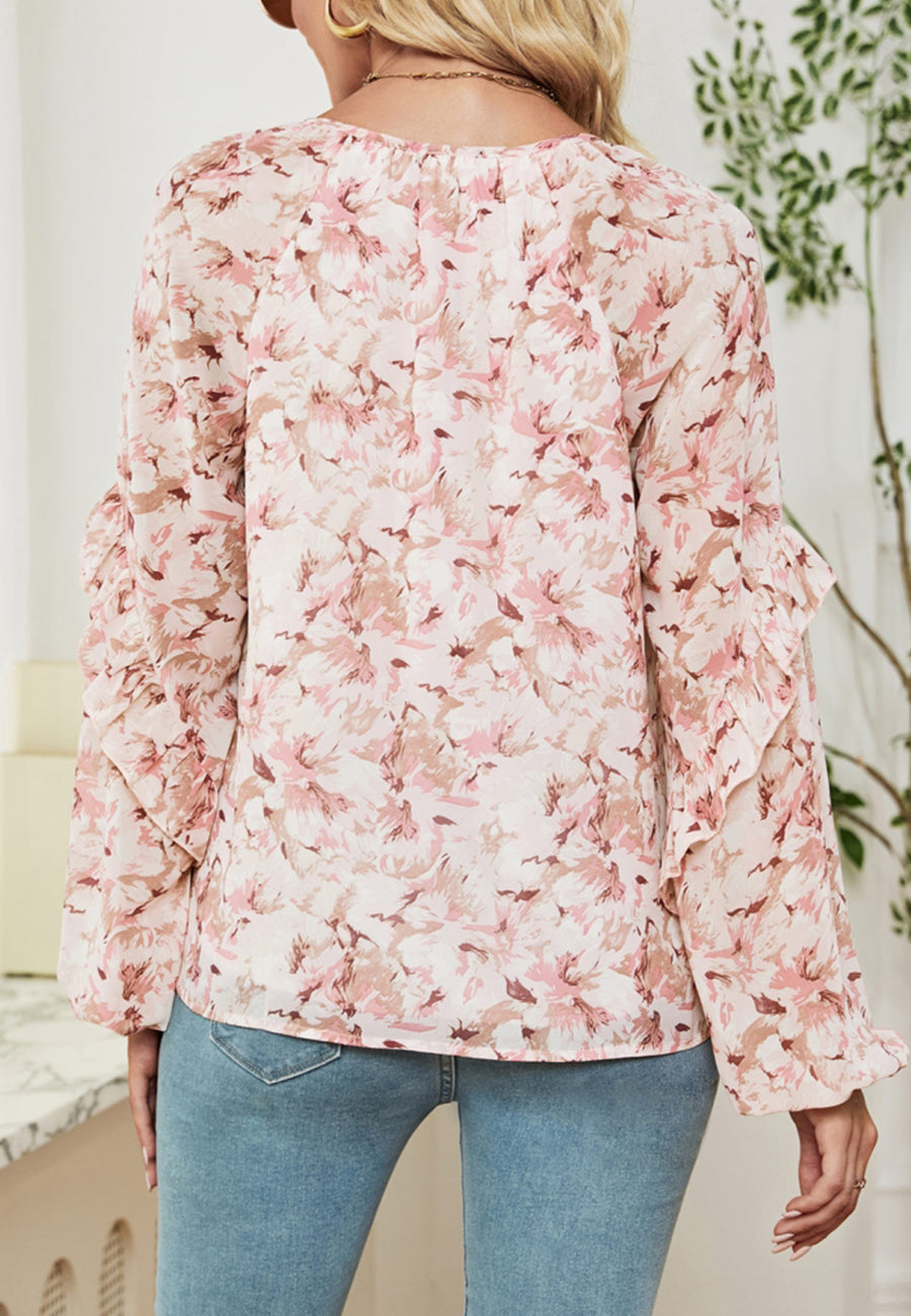 Blusa con volantes y estampado floral