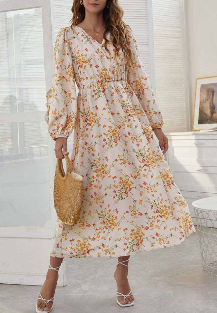 Vestido midi floral con escote cruzado