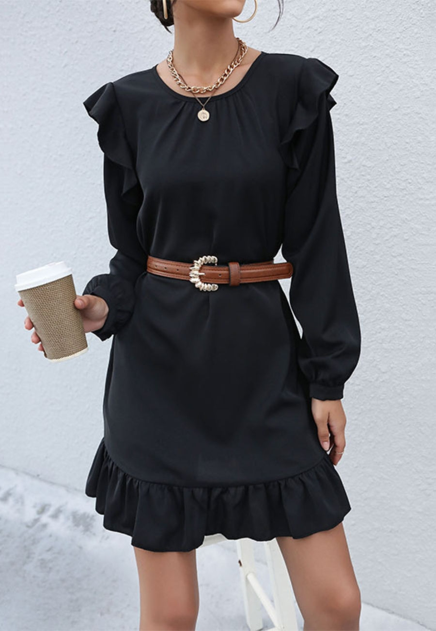 Vestido con detalle de volante y lazo en la espalda