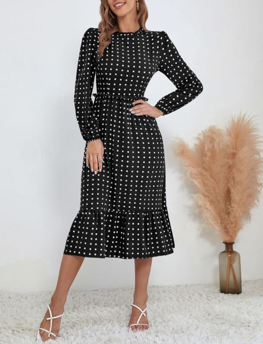 Vestido midi con escote redondo y bajo con volantes