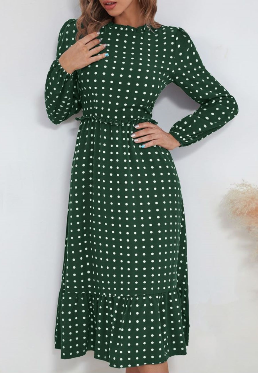 Vestido midi con escote redondo y bajo con volantes