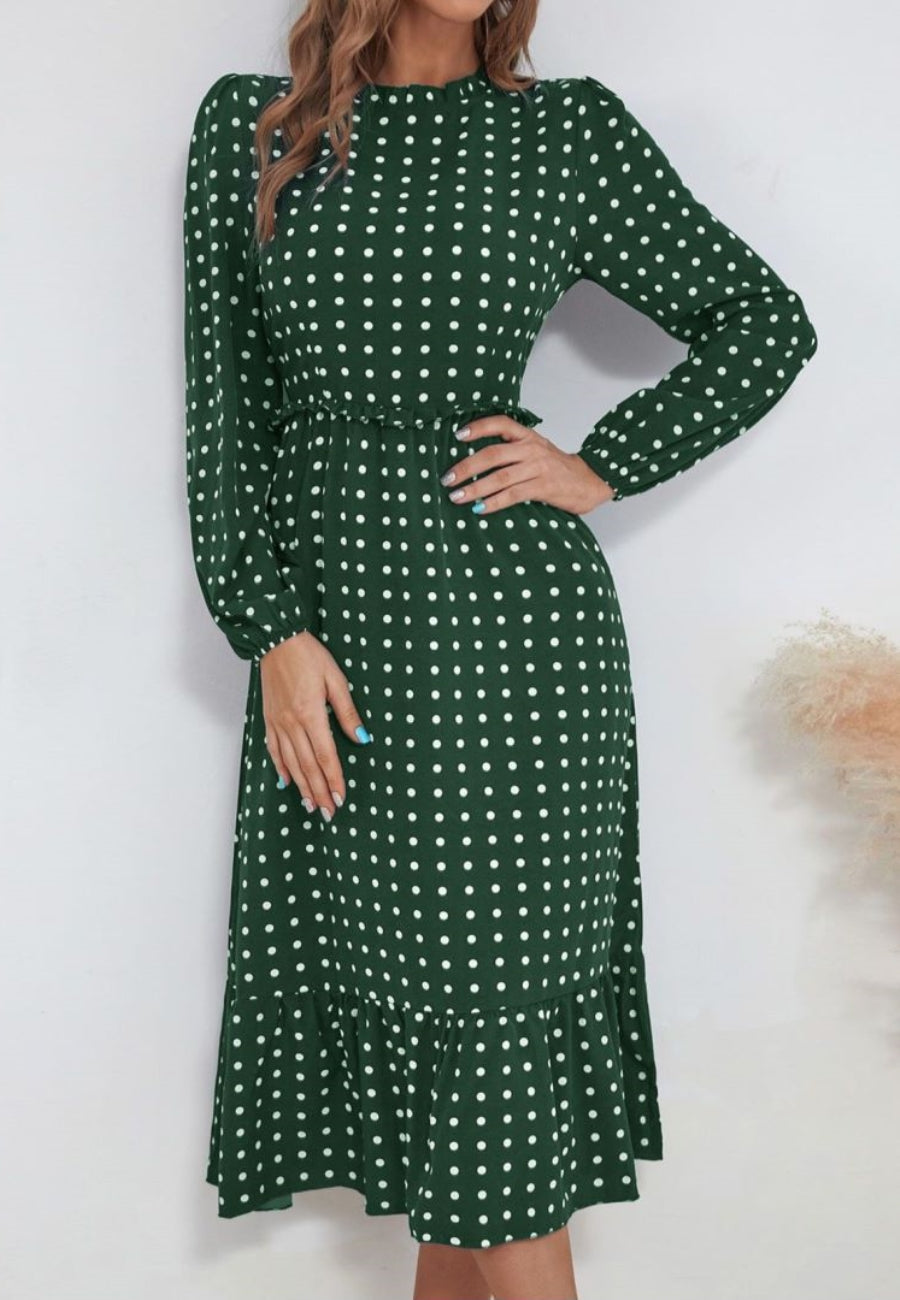 Vestido midi con escote redondo y bajo con volantes