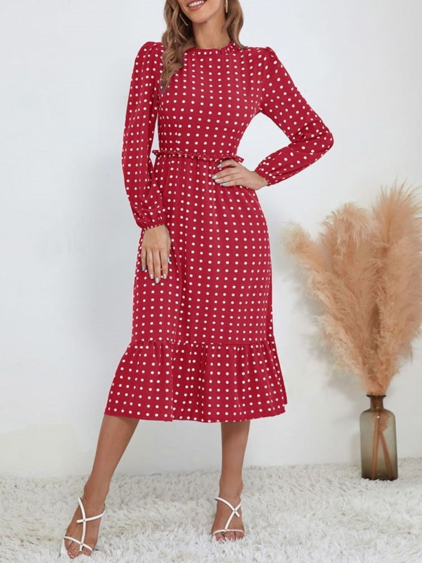 Vestido midi con escote redondo y bajo con volantes