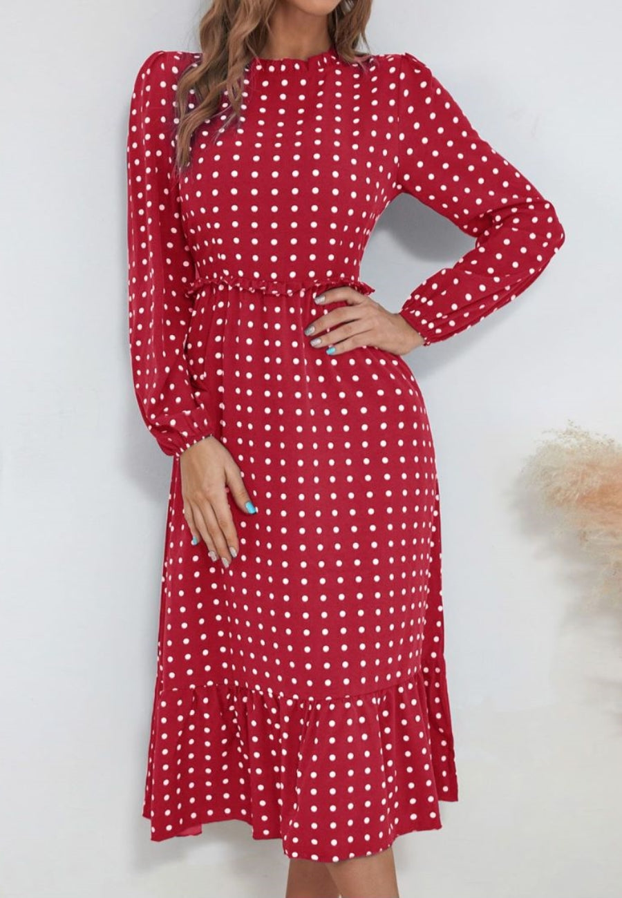 Vestido midi con escote redondo y bajo con volantes