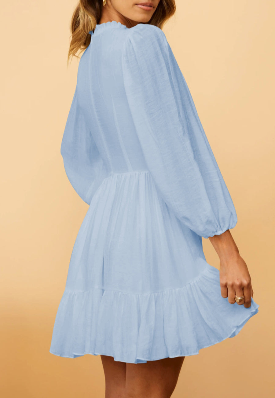 Vestido con vuelo y dobladillo fruncido