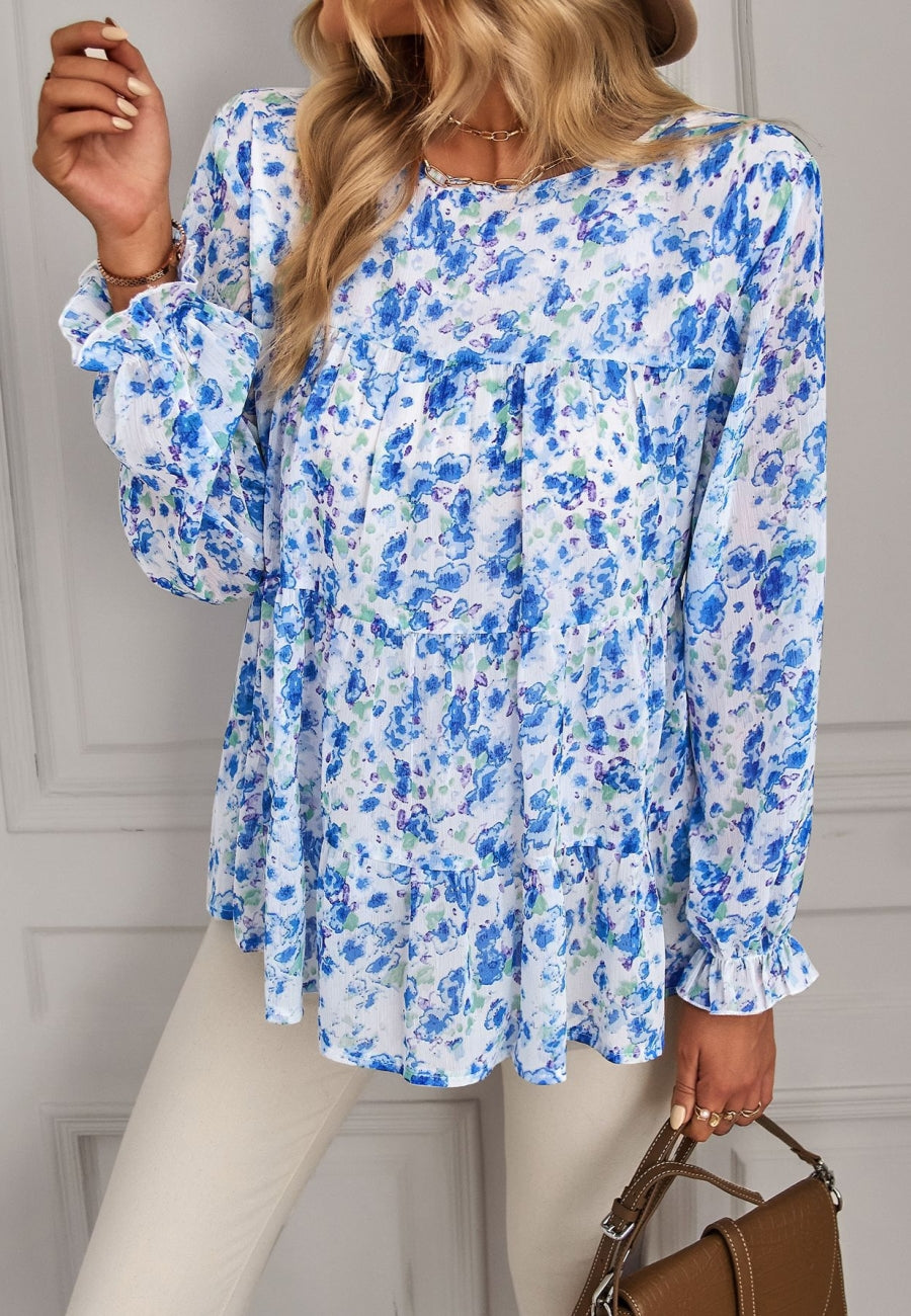 Blusa estampada con cuello redondo y capas