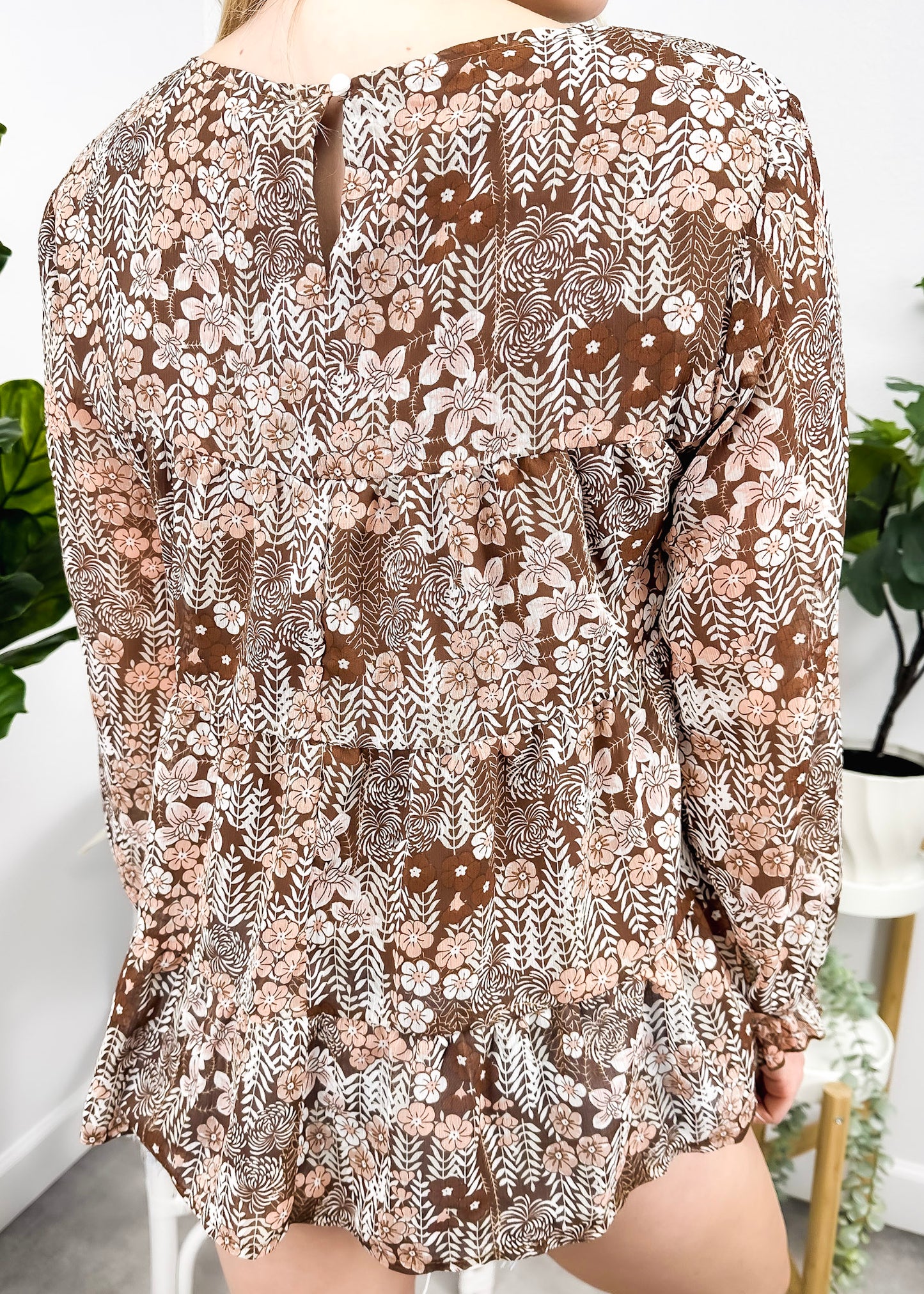 Blusa estampada con cuello redondo y capas