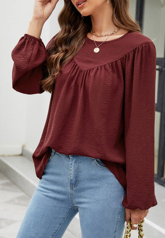 Blusa con volantes en forma de V