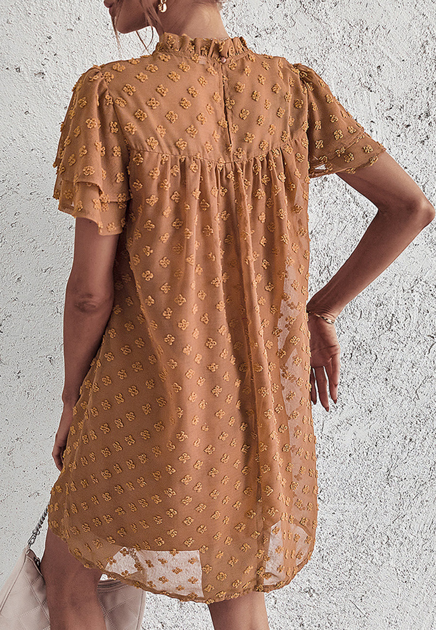 Vestido con mangas abullonadas y capas