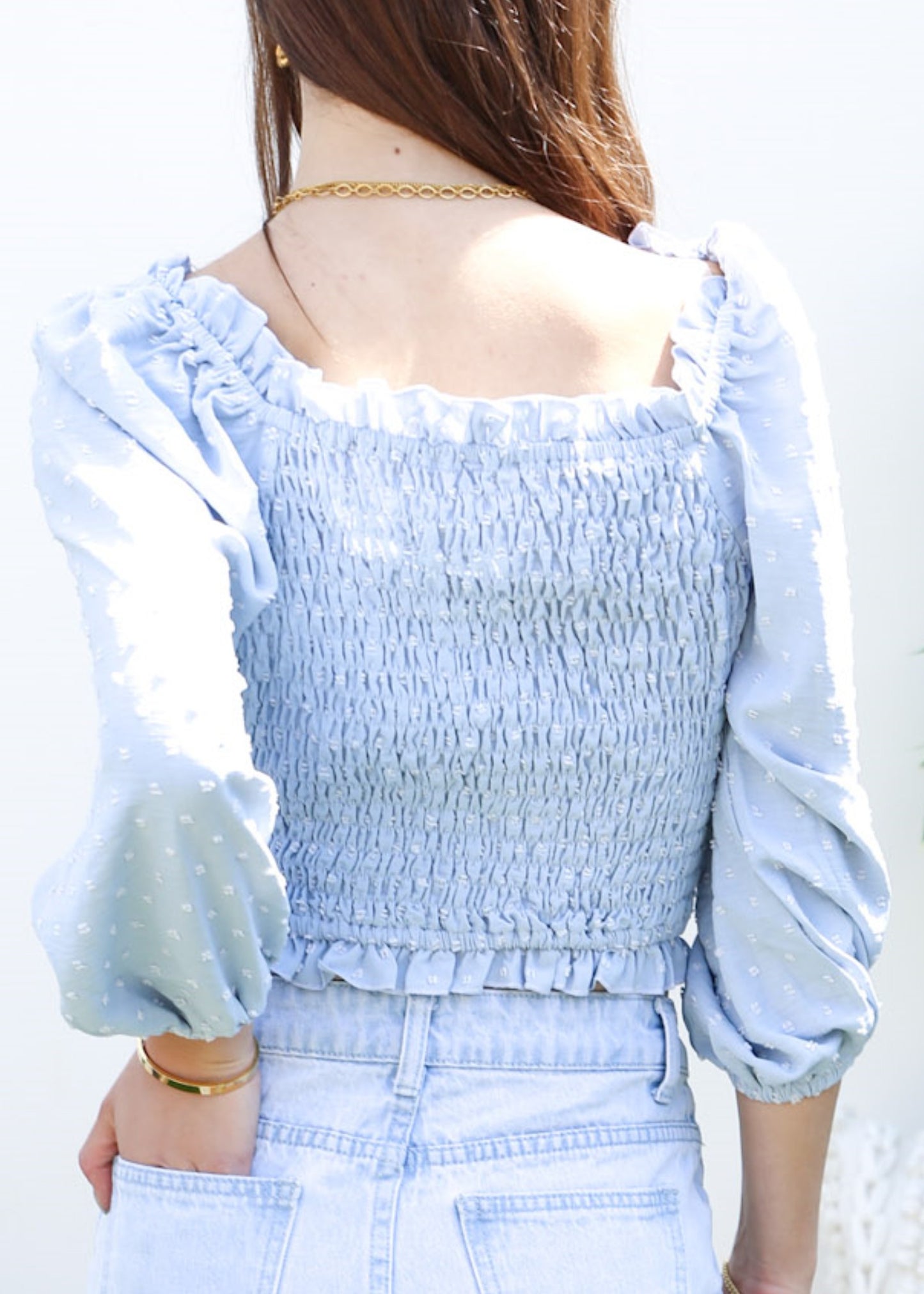 Blusa fruncida con escote cuadrado y volantes