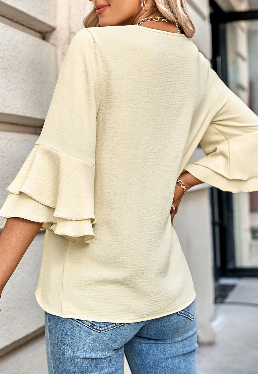 Blusa con mangas con volantes en capas