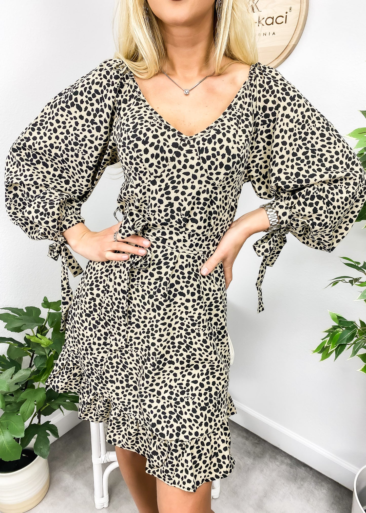 Vestido con lazo y estampado de guepardo