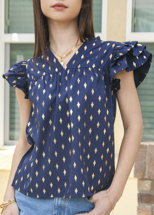 Blusa con mangas con volantes y estampado brillante