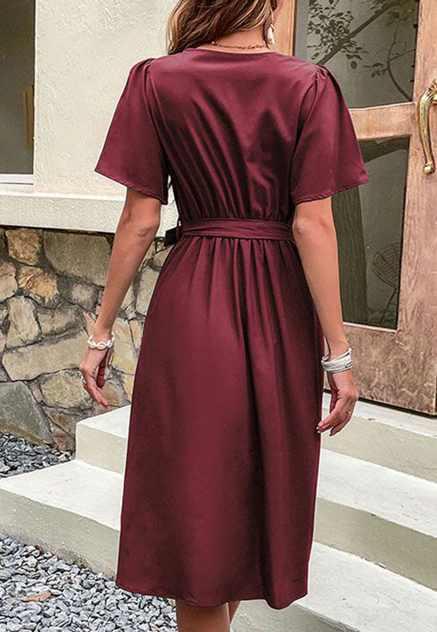 Solid Surplice Neck Button Detail Dress