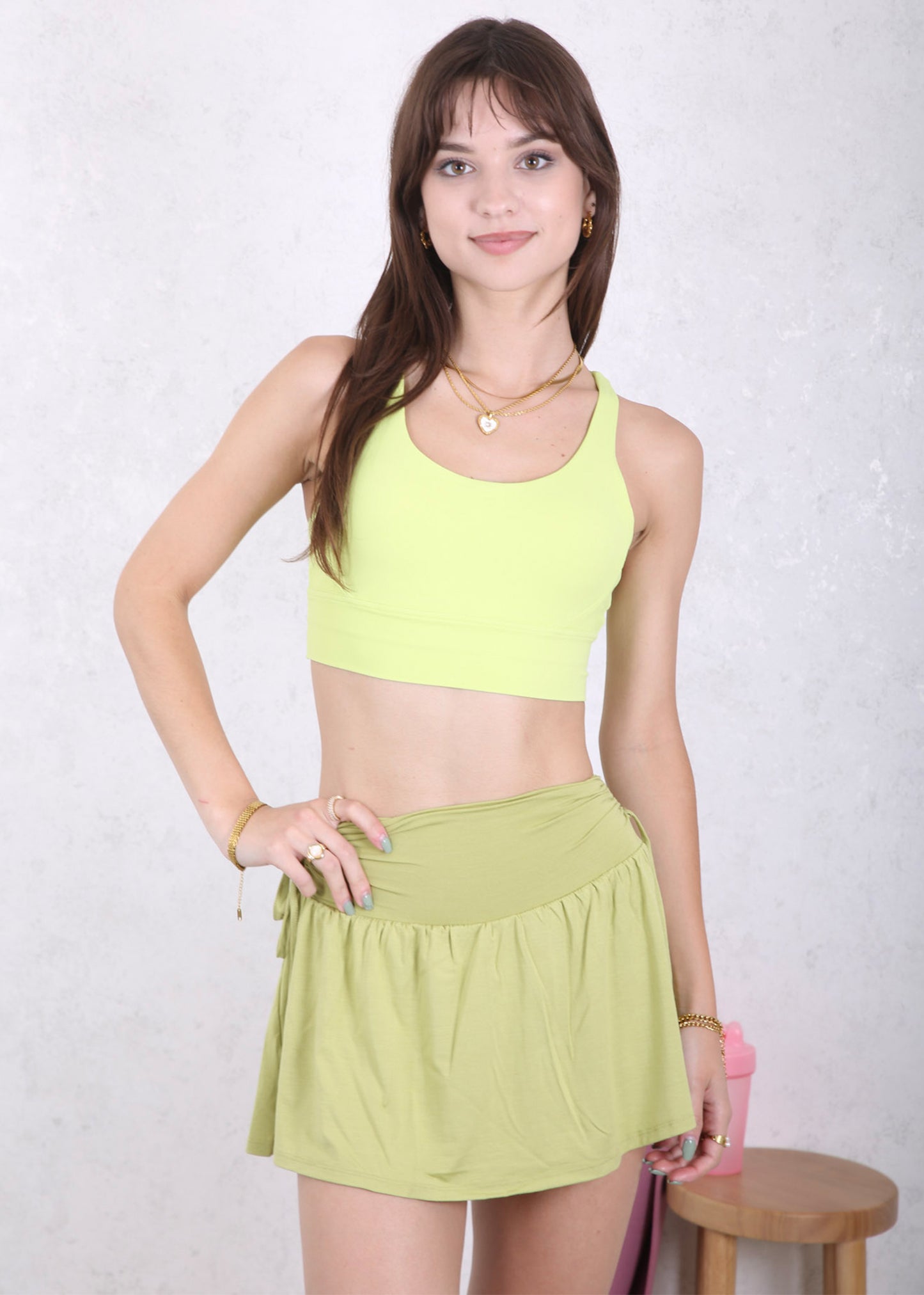 Falda deportiva con lazo y frunces laterales