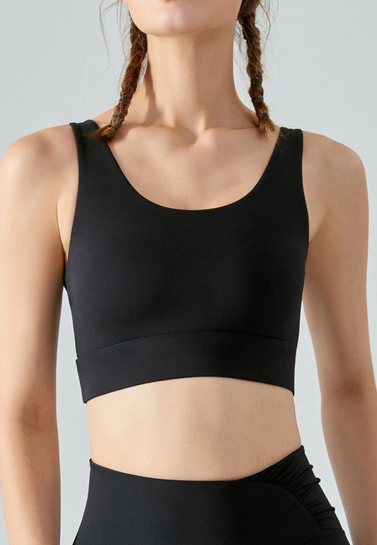Top deportivo con doble tira en la espalda