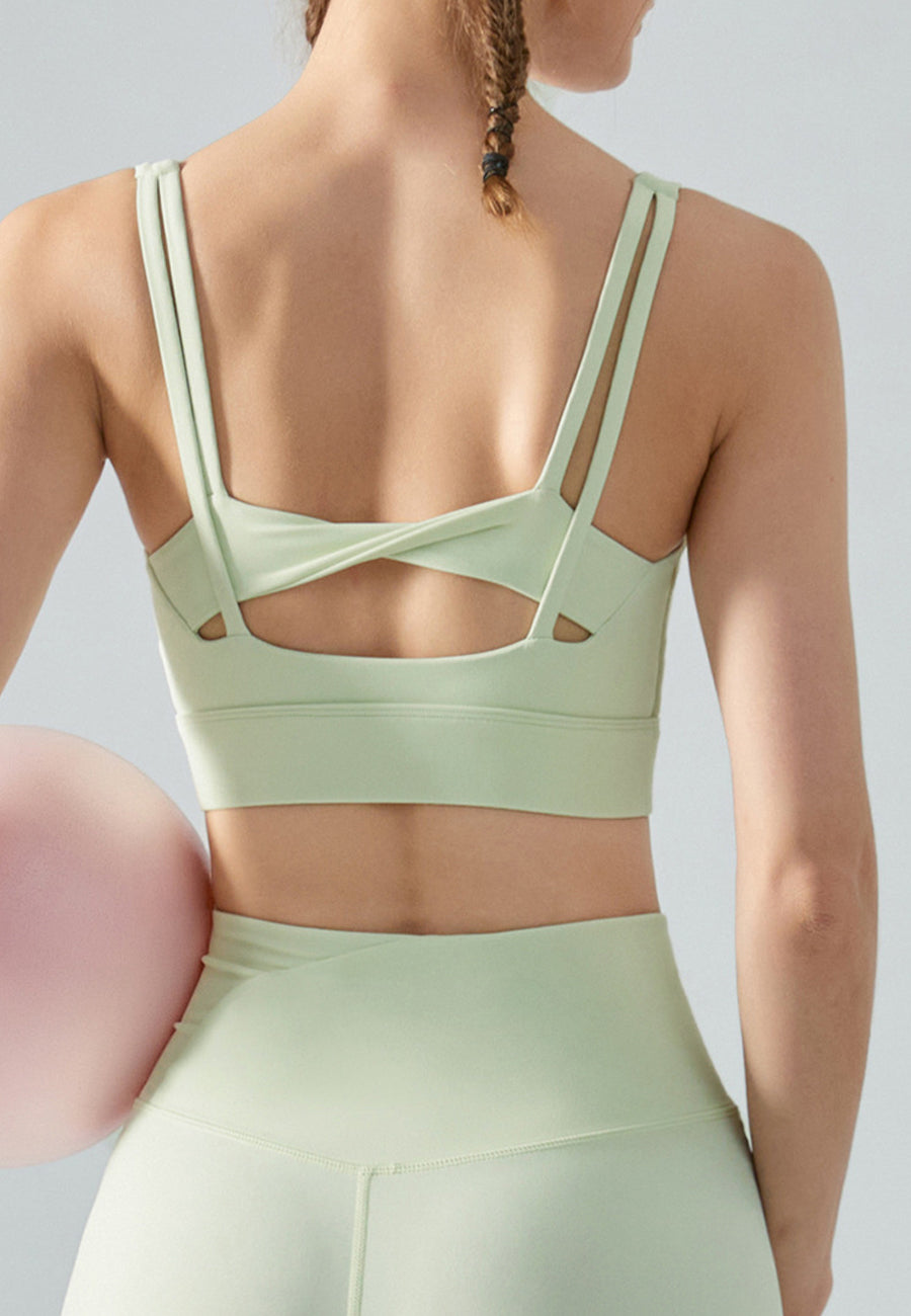 Top deportivo con doble tira en la espalda