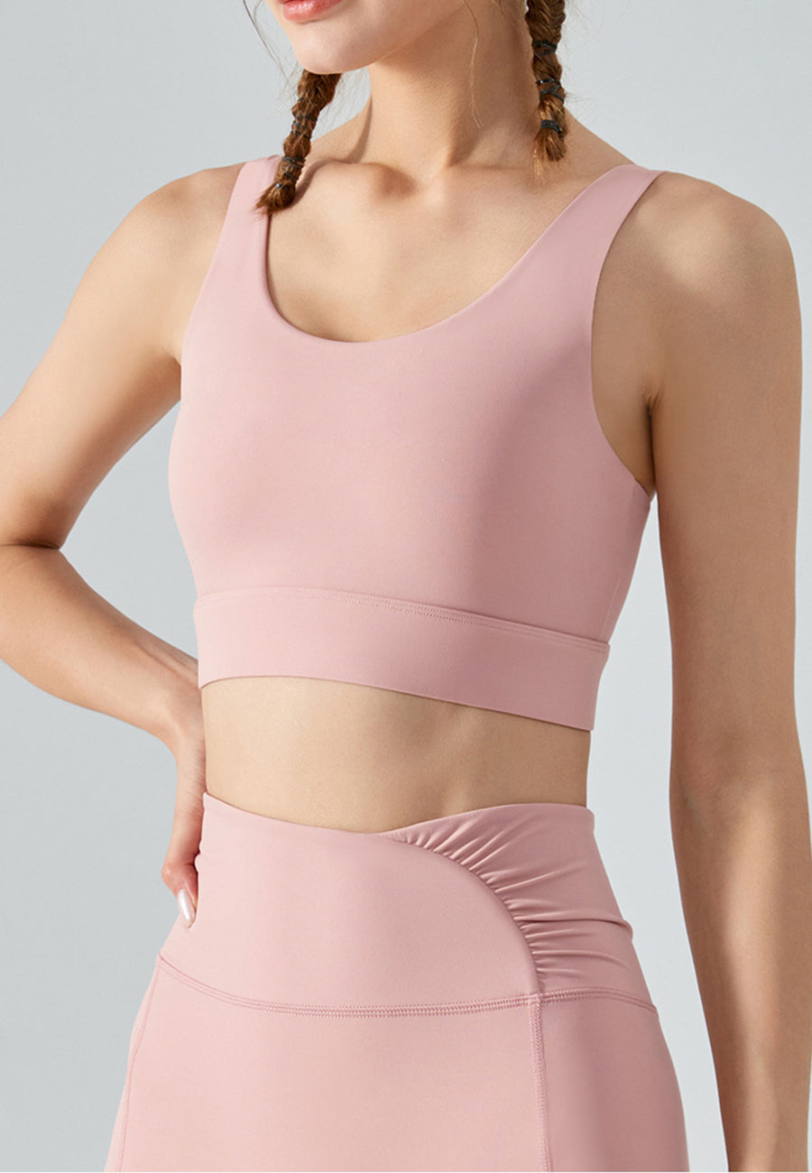 Top deportivo con doble tira en la espalda