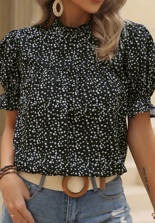 Blusa con escote con volantes y abertura en la espalda