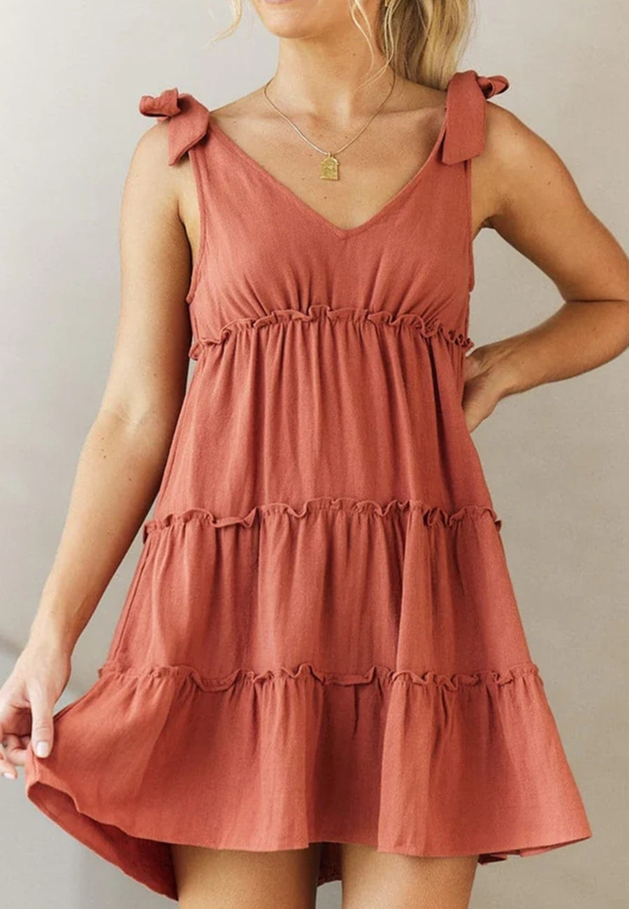 Vestido con escote en V y lazo en los hombros
