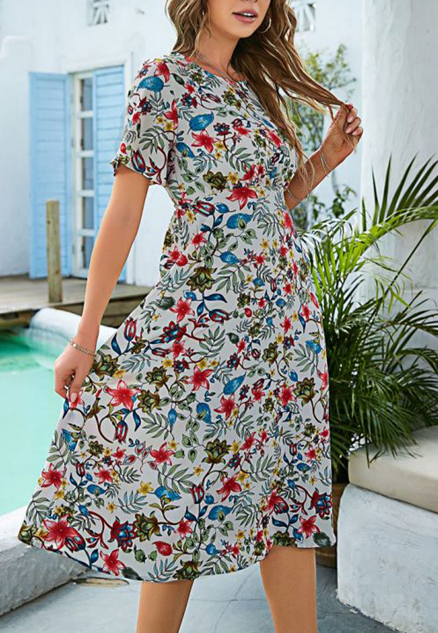 Vestido con estampado floral y cintura plisada