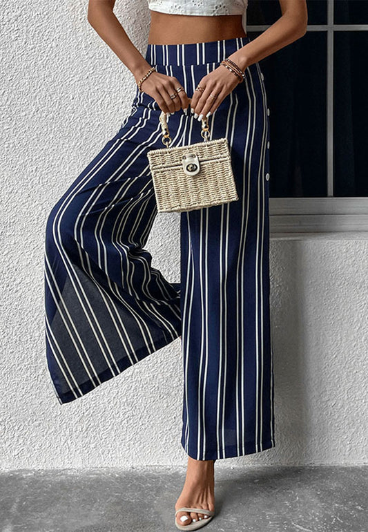 Pantalones con aberturas laterales y estampado de rayas