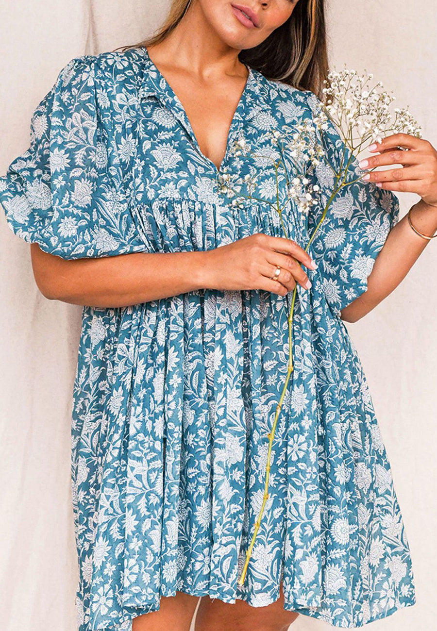 Vestido plisado con mangas dolman y estampado floral