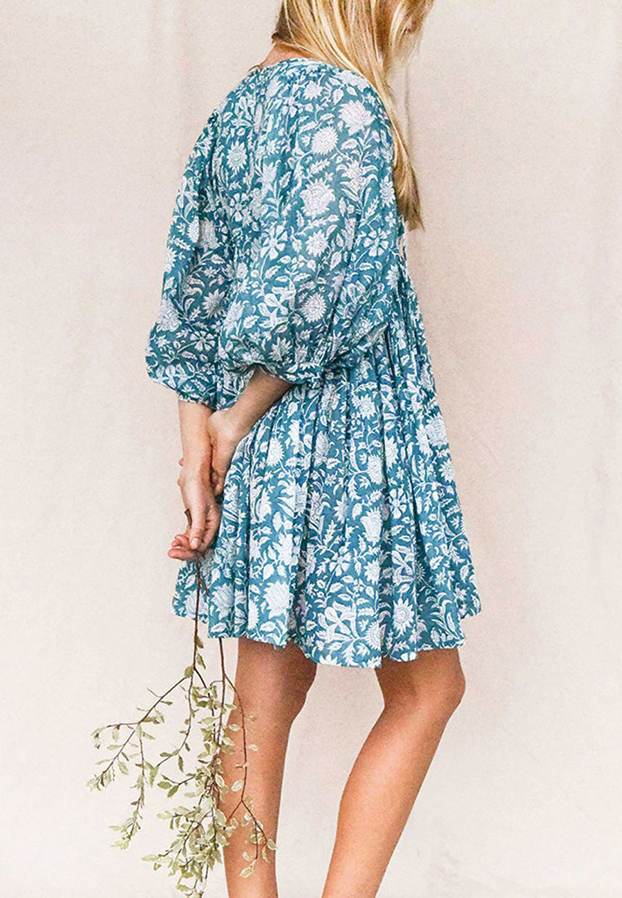 Vestido plisado con mangas dolman y estampado floral