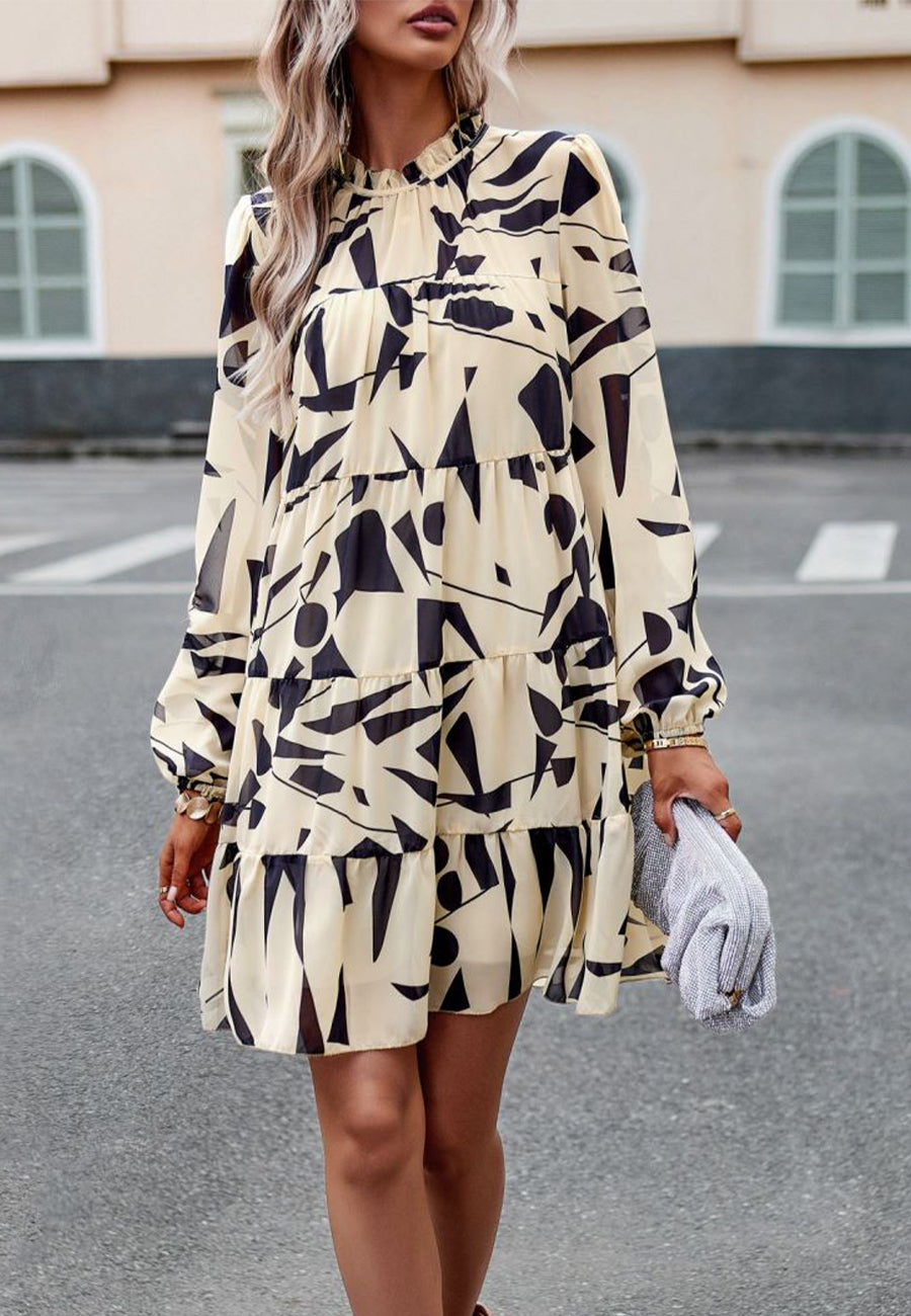 Vestido de manga larga con capas y estampado abstracto