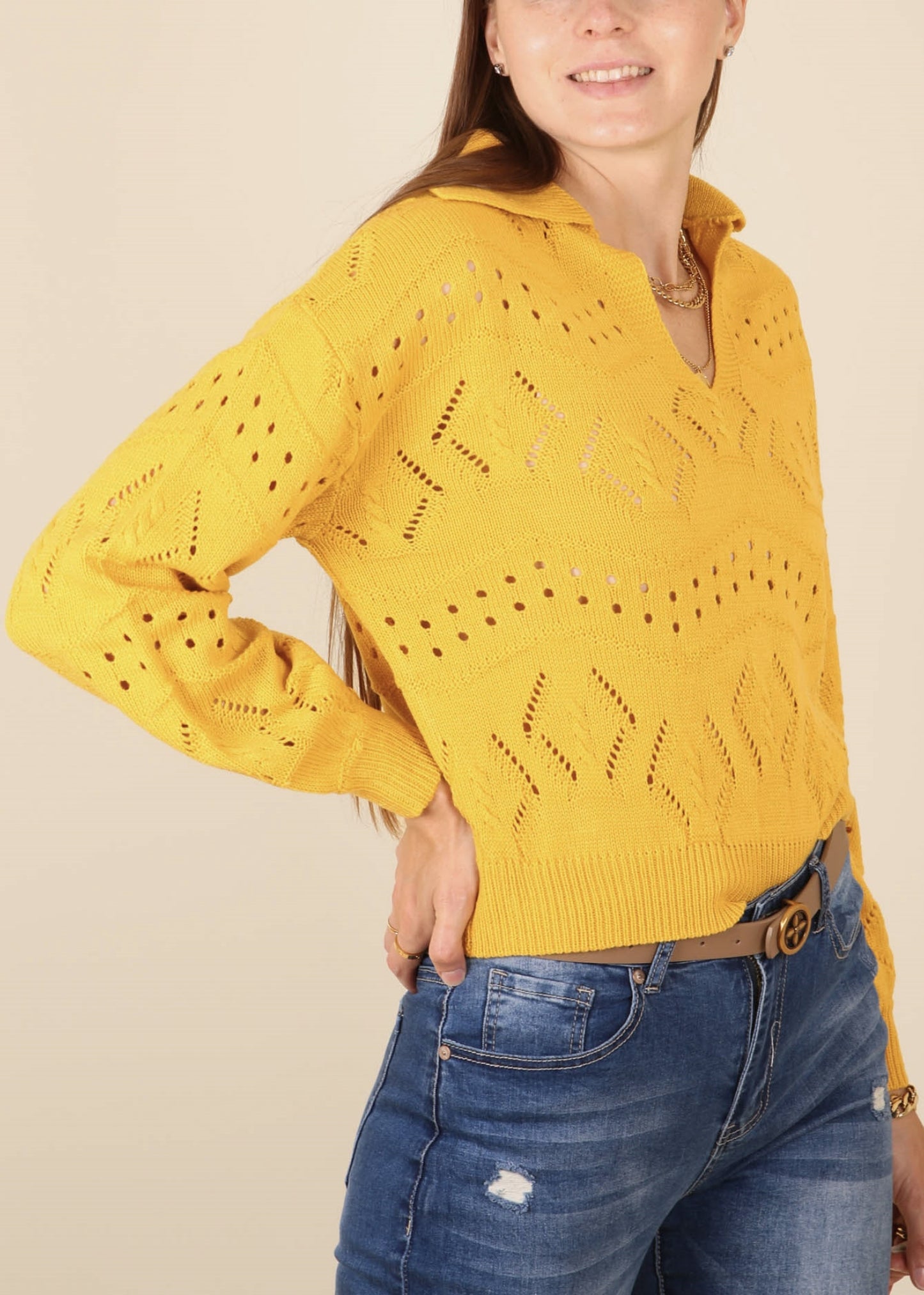 Suéter de punto con ojales en color liso