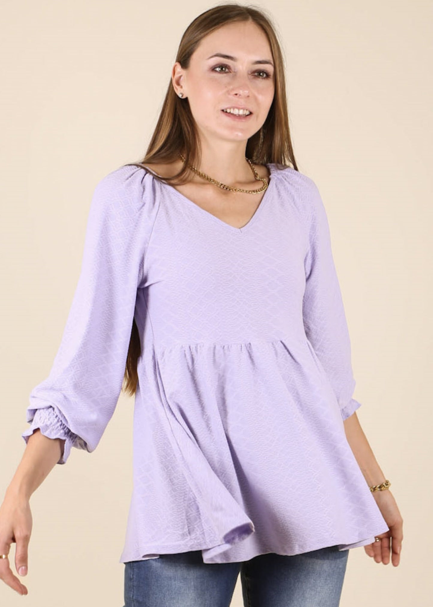 Top largo con escote en V y textura