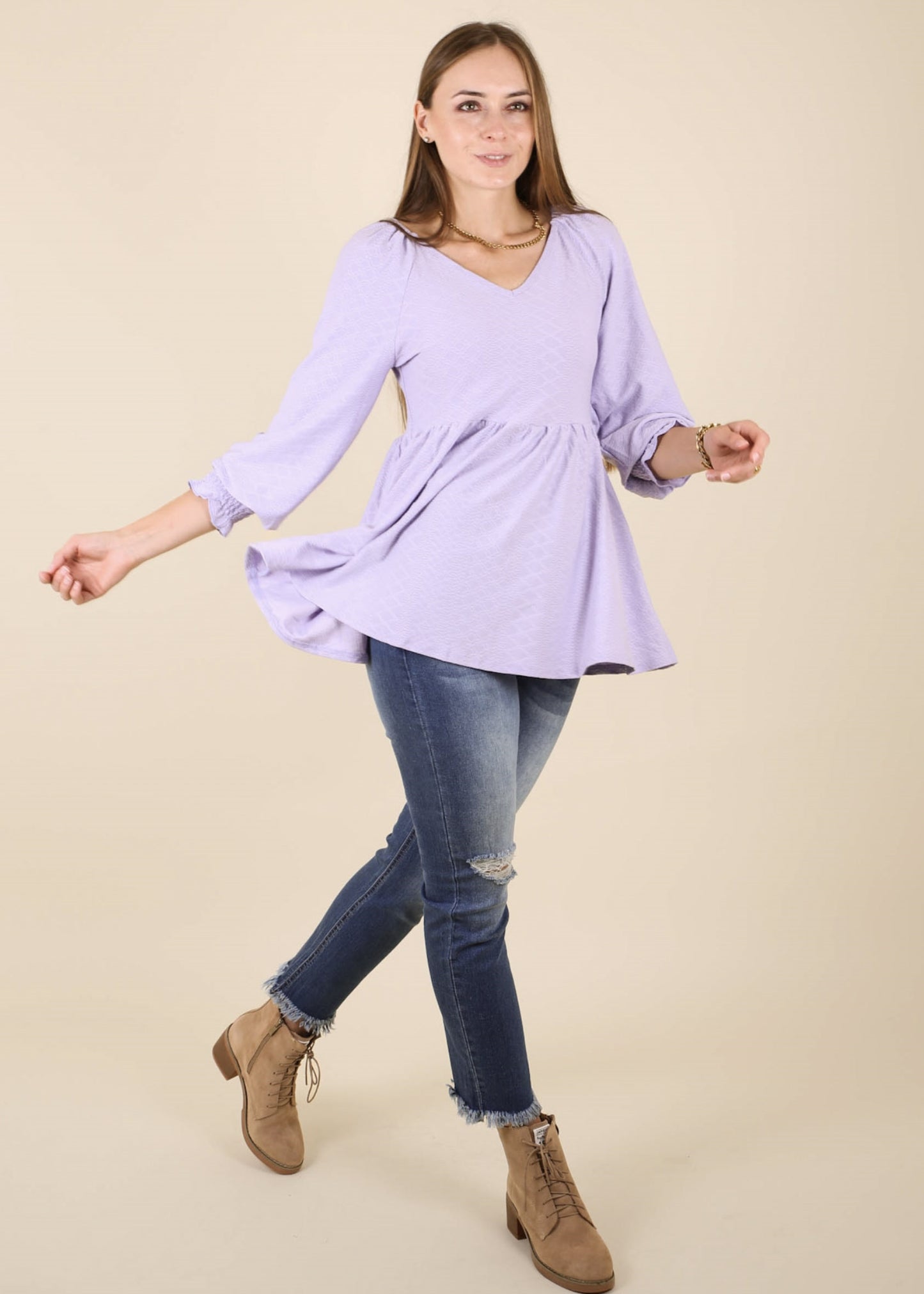 Top largo con escote en V y textura