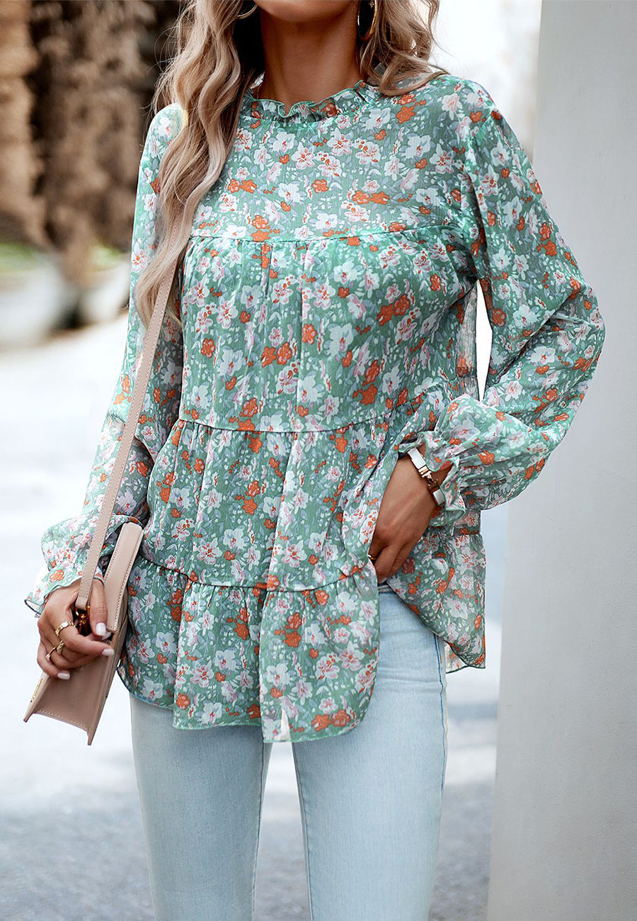 Blusa con volantes y flores en capas