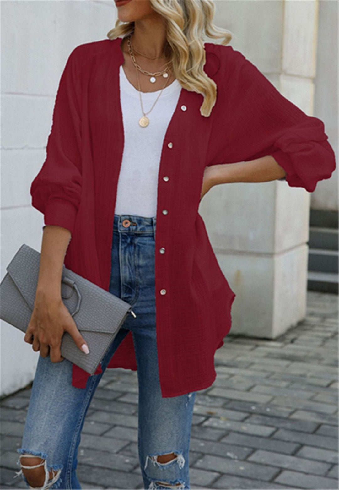 Blusa con botones y mangas holgadas