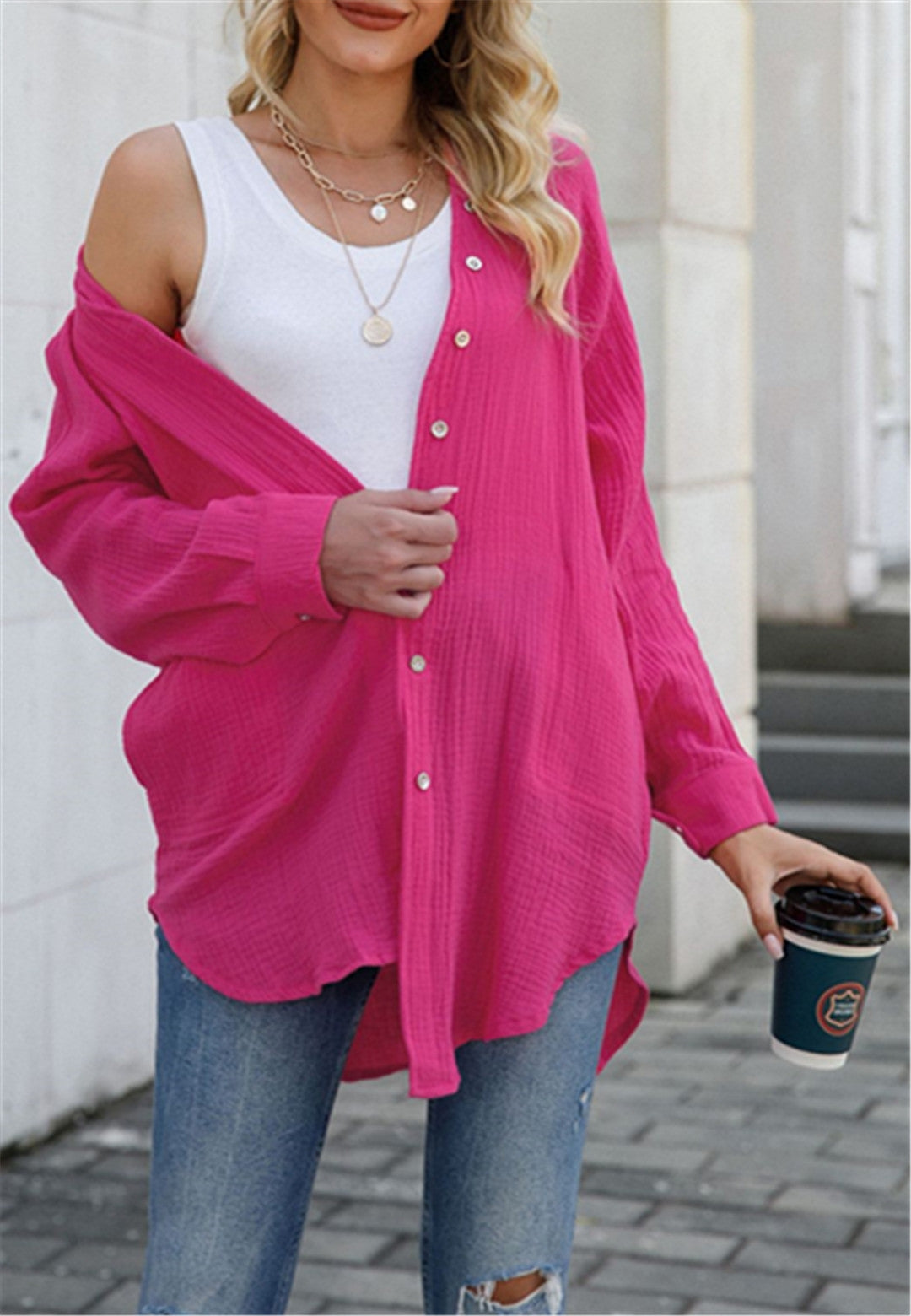 Blusa con botones y mangas holgadas