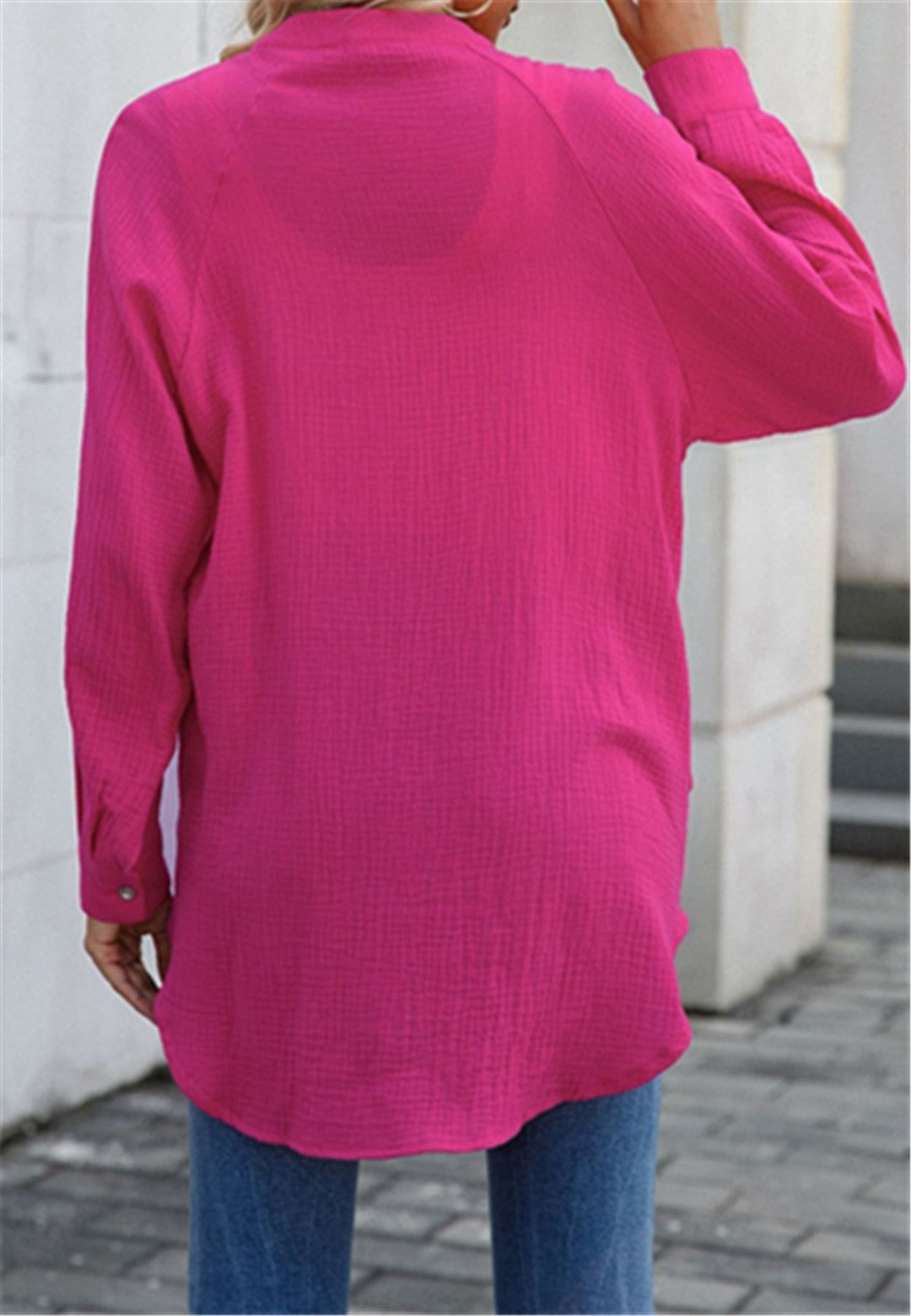 Blusa con botones y mangas holgadas