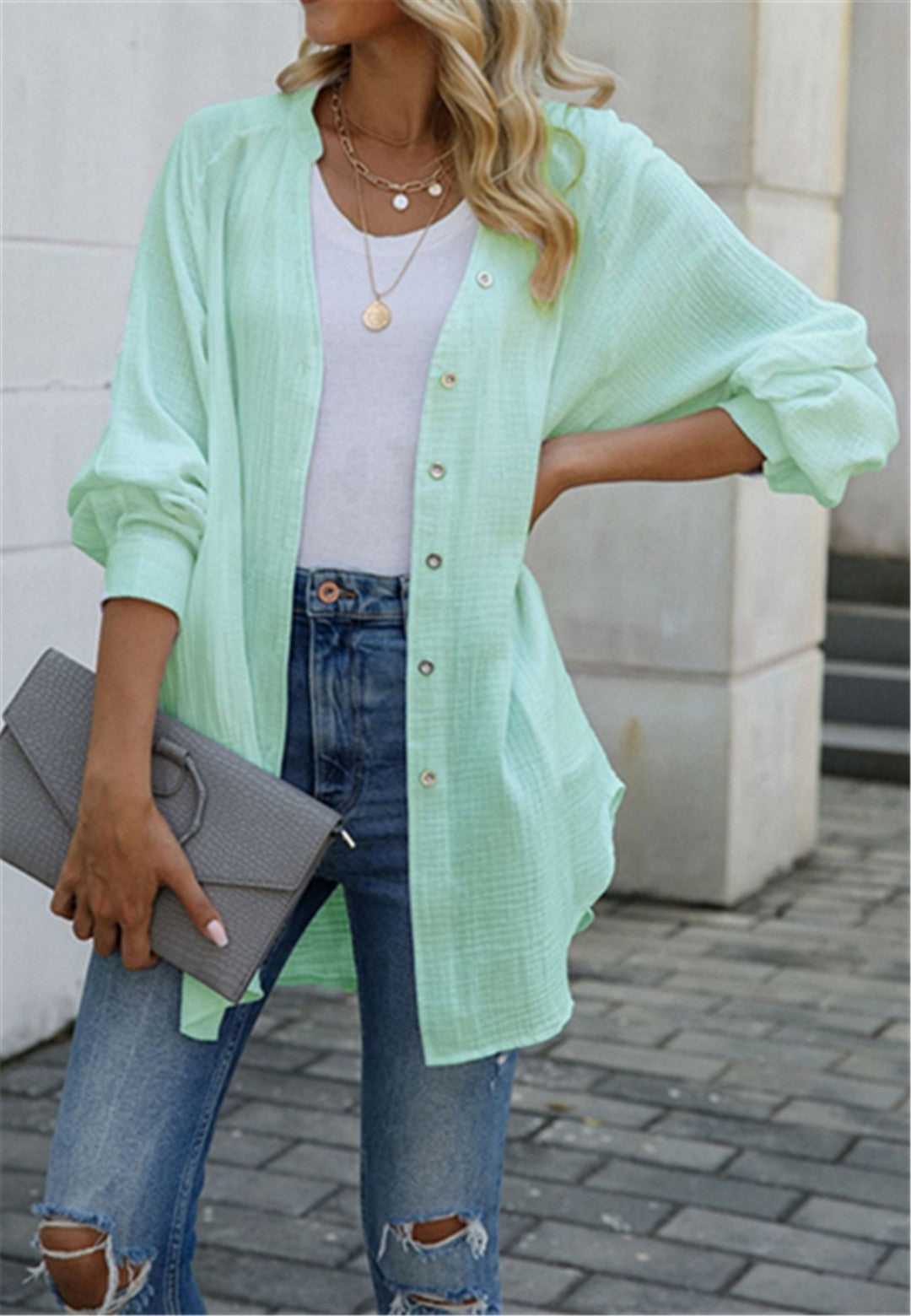 Blusa con botones y mangas holgadas