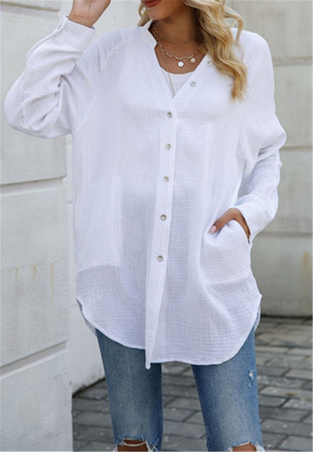 Blusa con botones y mangas holgadas