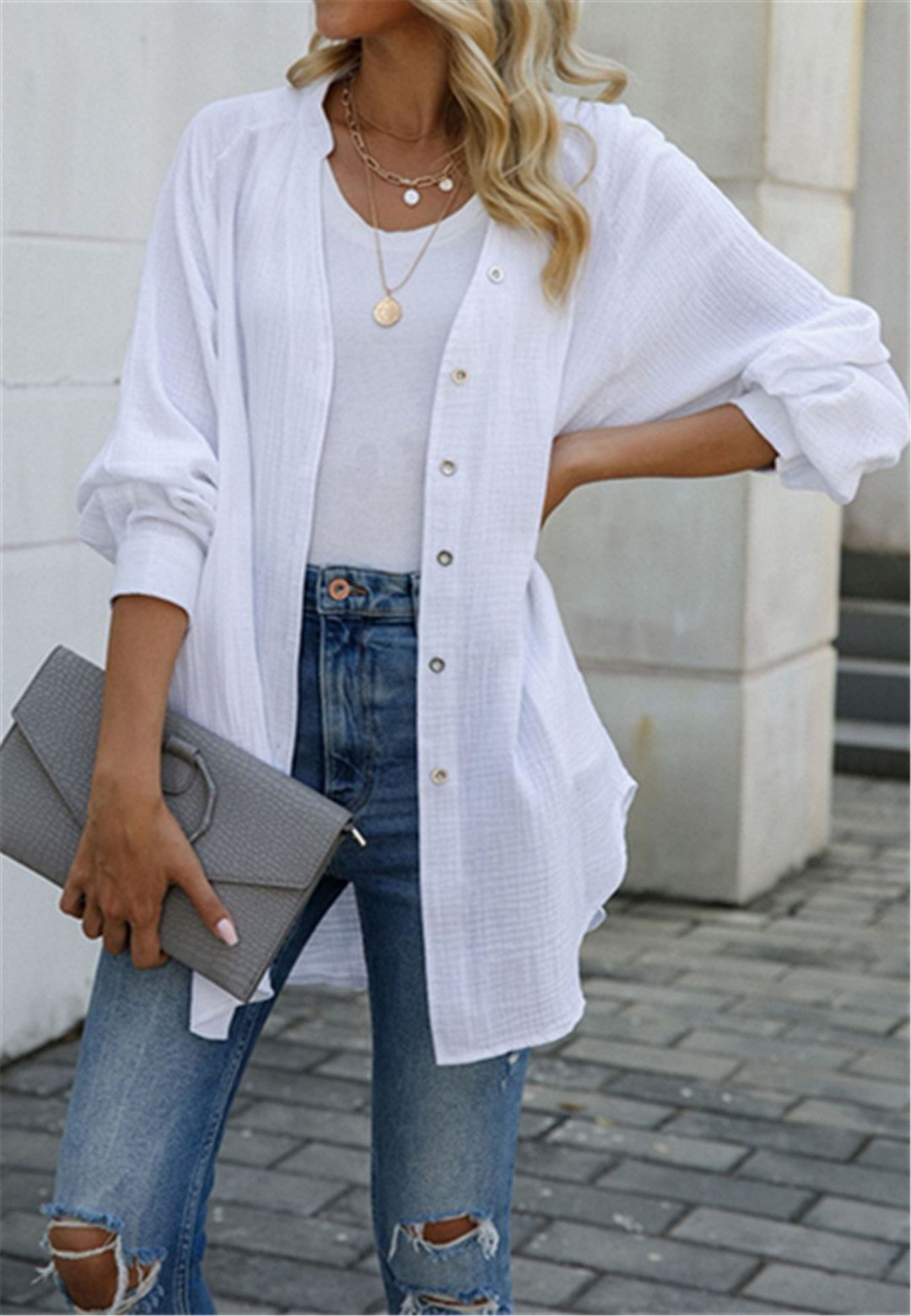 Blusa con botones y mangas holgadas