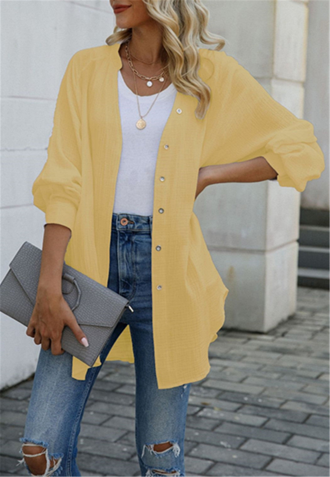 Blusa con botones y mangas holgadas