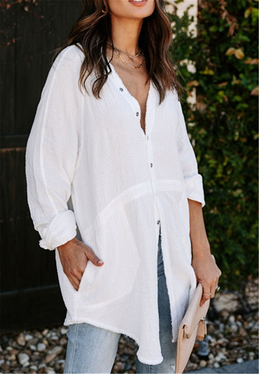 Blusa con botones y bolsillos laterales dobles