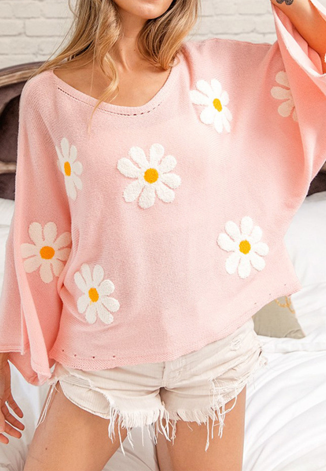 Suéter holgado con estampado de margaritas