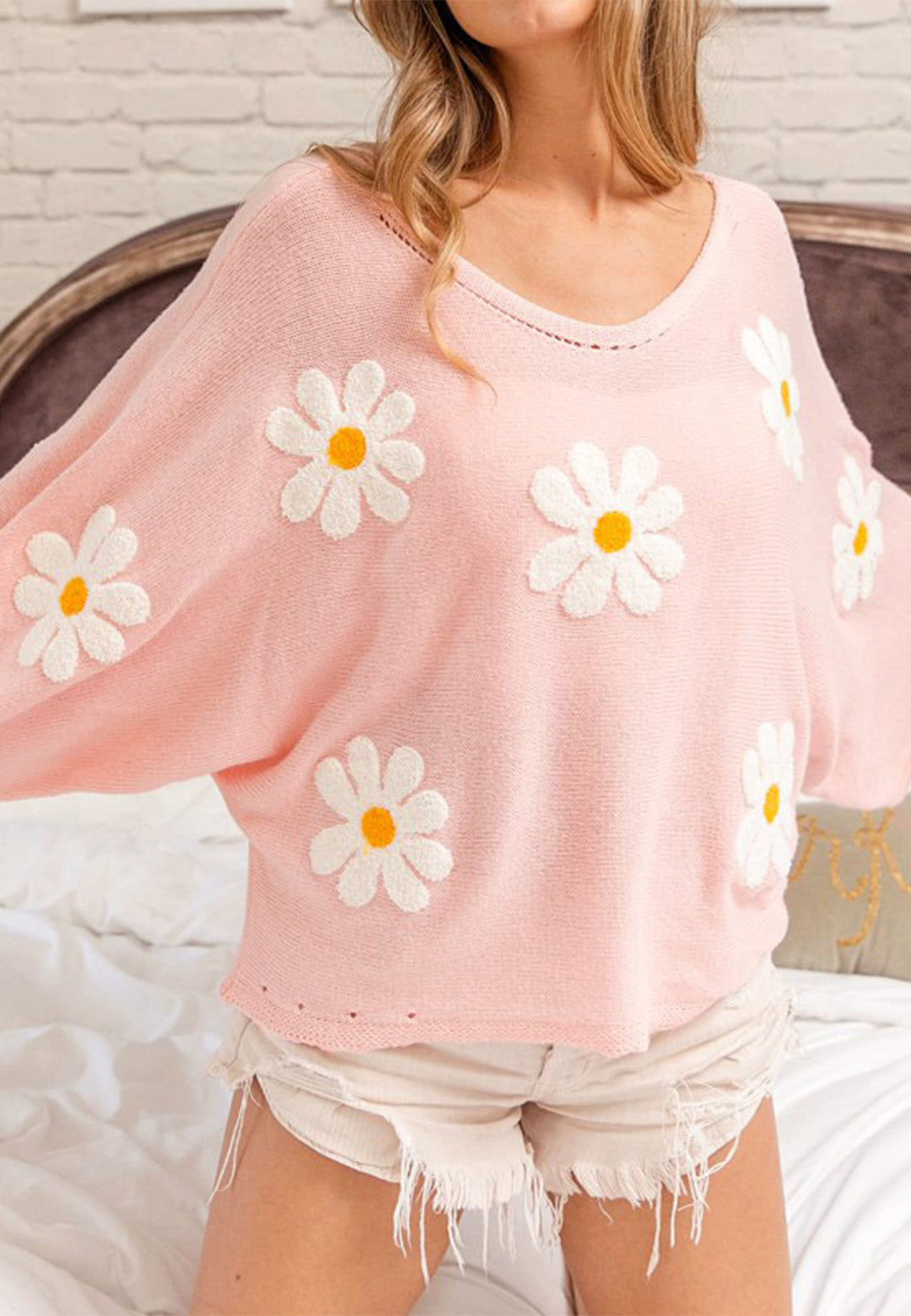 Suéter holgado con estampado de margaritas