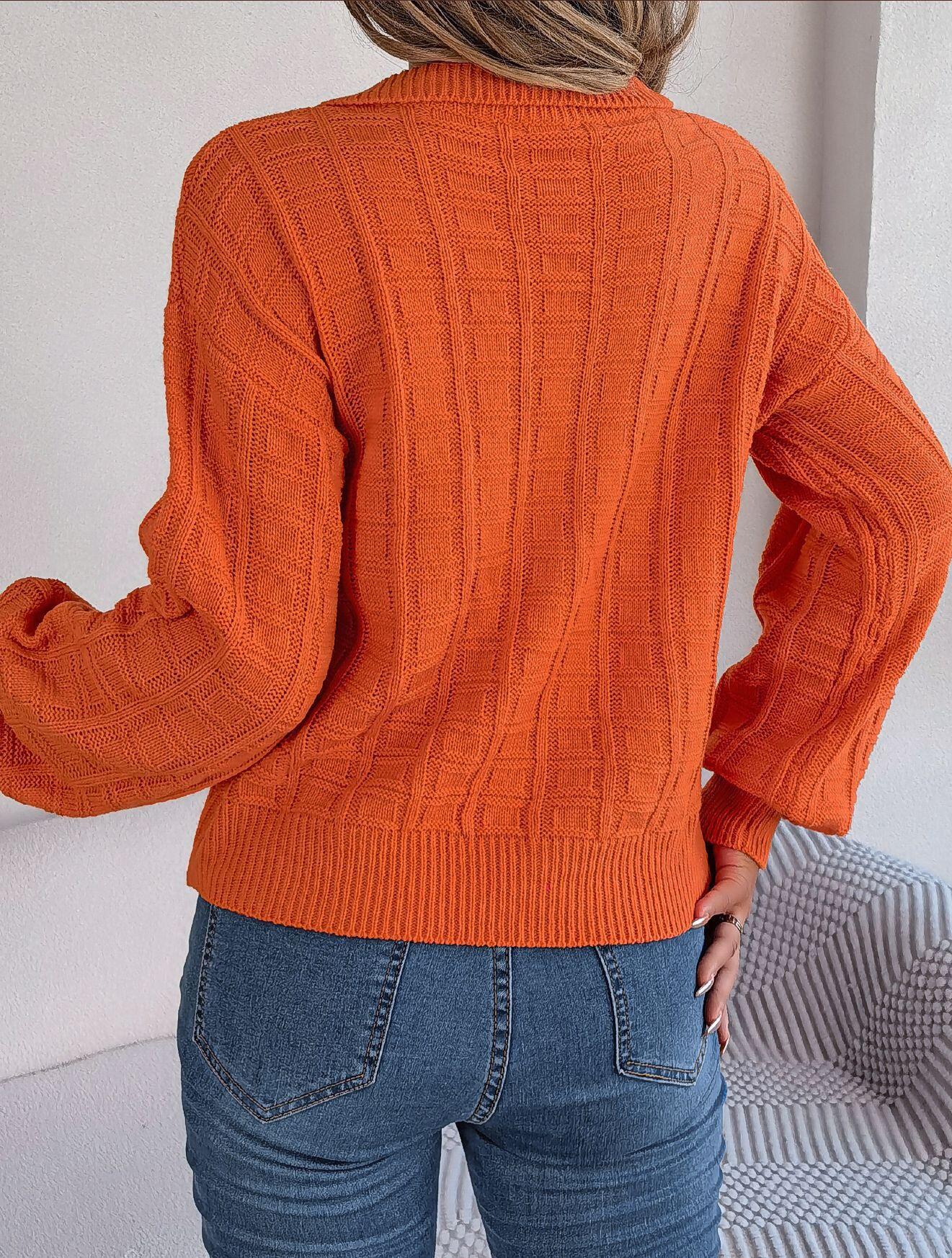 Suéter con cuello y estampado de cuadrados