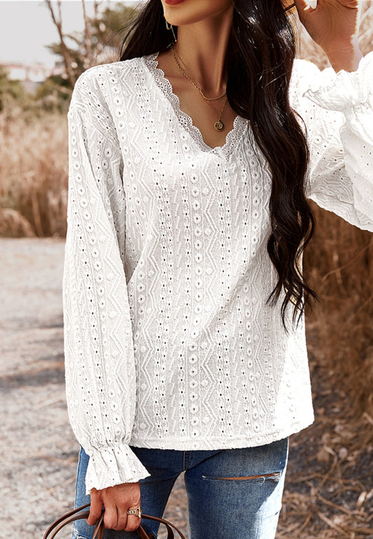 Blusa bordada con tapiz de color liso