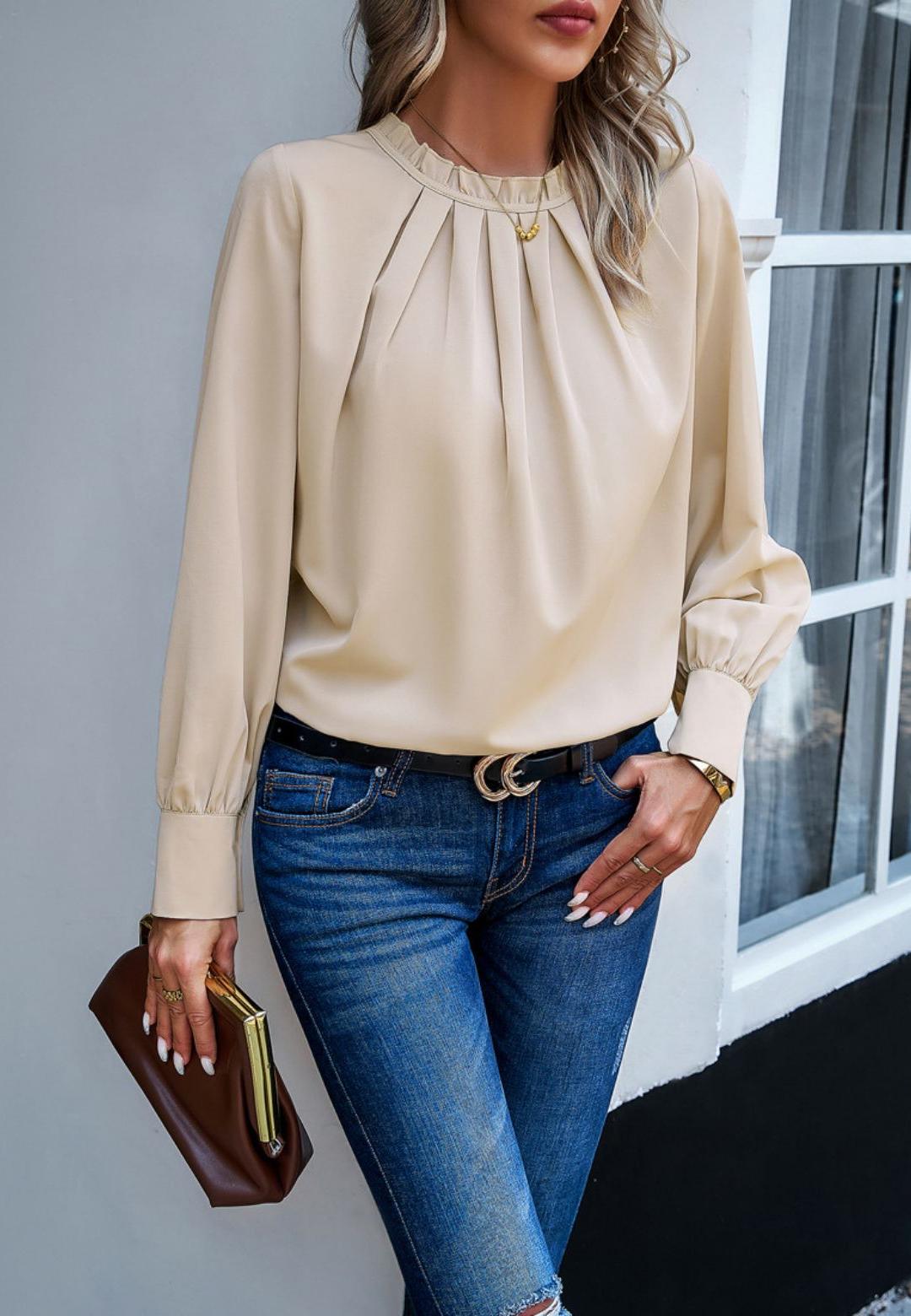 Blusa con cuello redondo y volantes