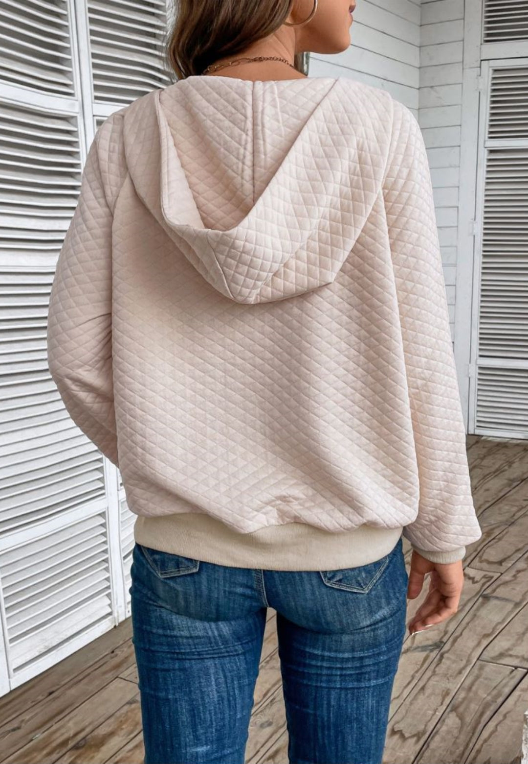 Sudadera con capucha acolchada y cremallera de un cuarto